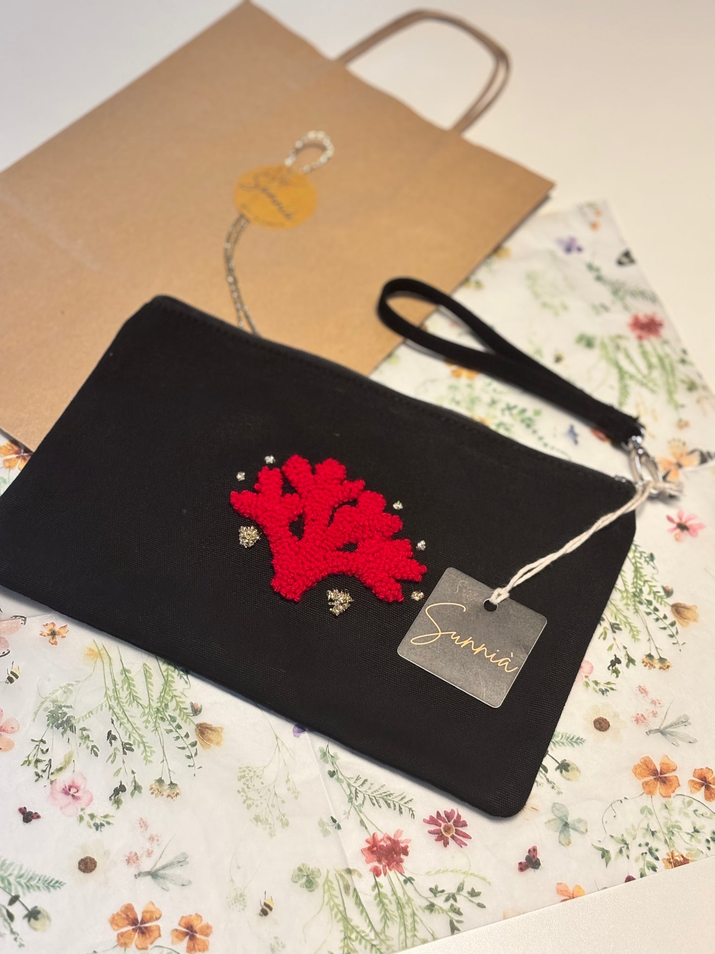 Embroidered pouch – Red coral on black background