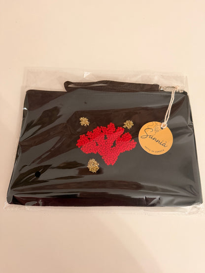Embroidered pouch – Red coral on black background